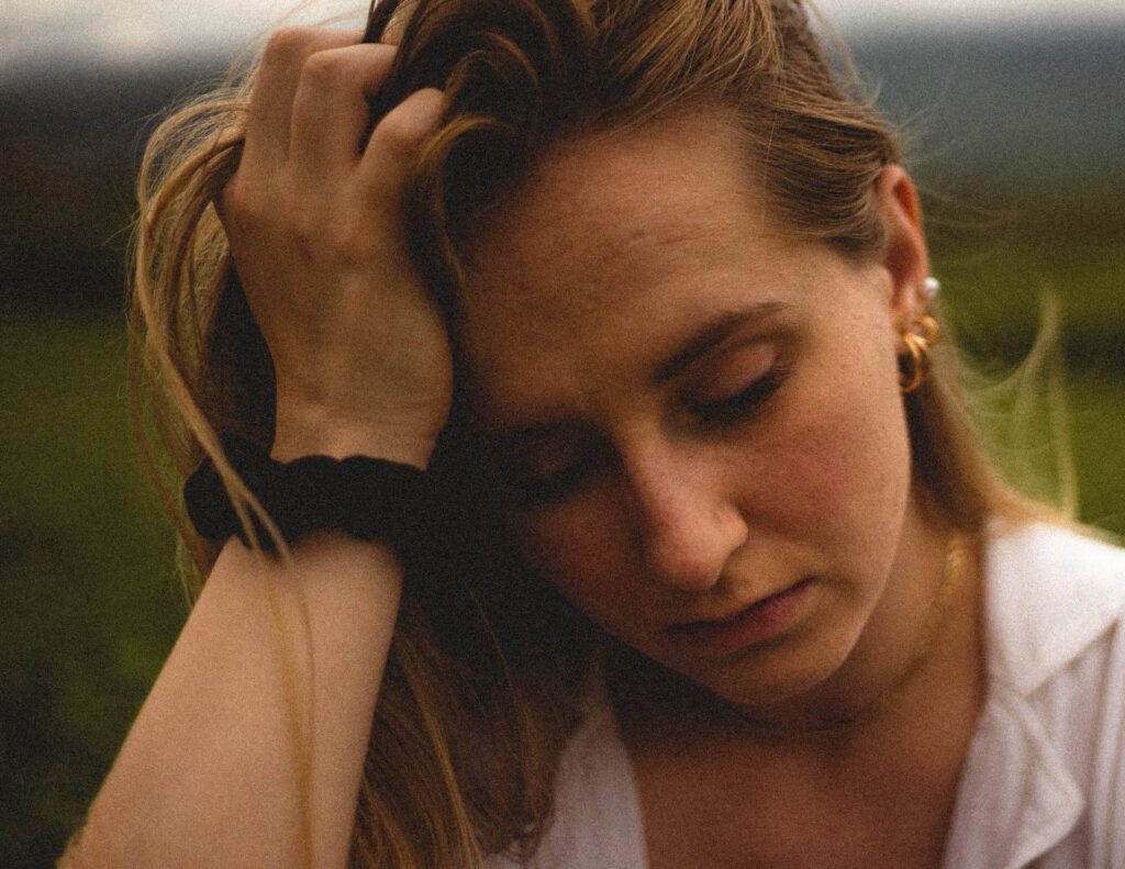 overwhelmed woman looking worried
