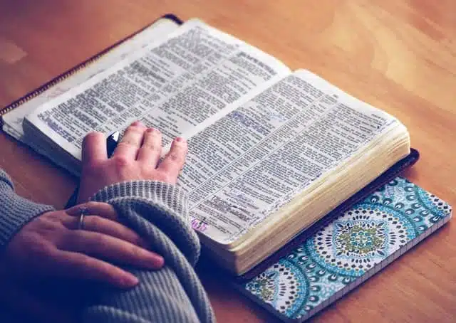 woman with bible opened