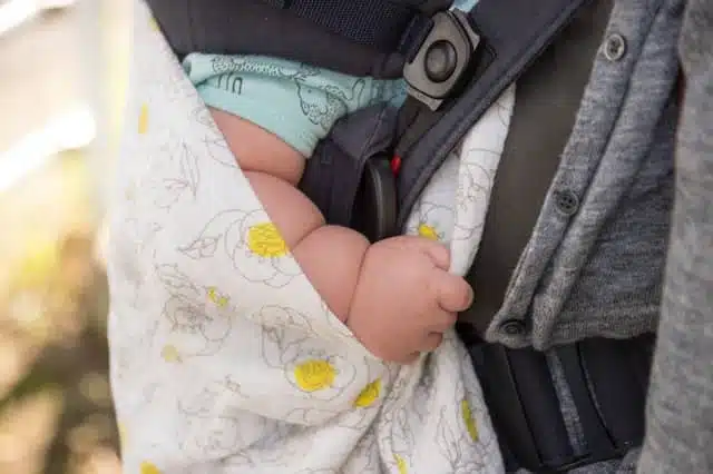 baby secured in a safety seat - car seat safety