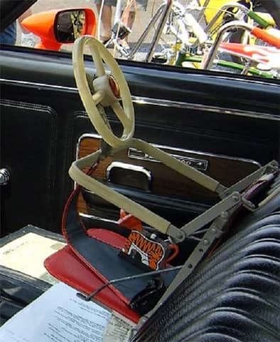 dummy steering-wheel on car seat