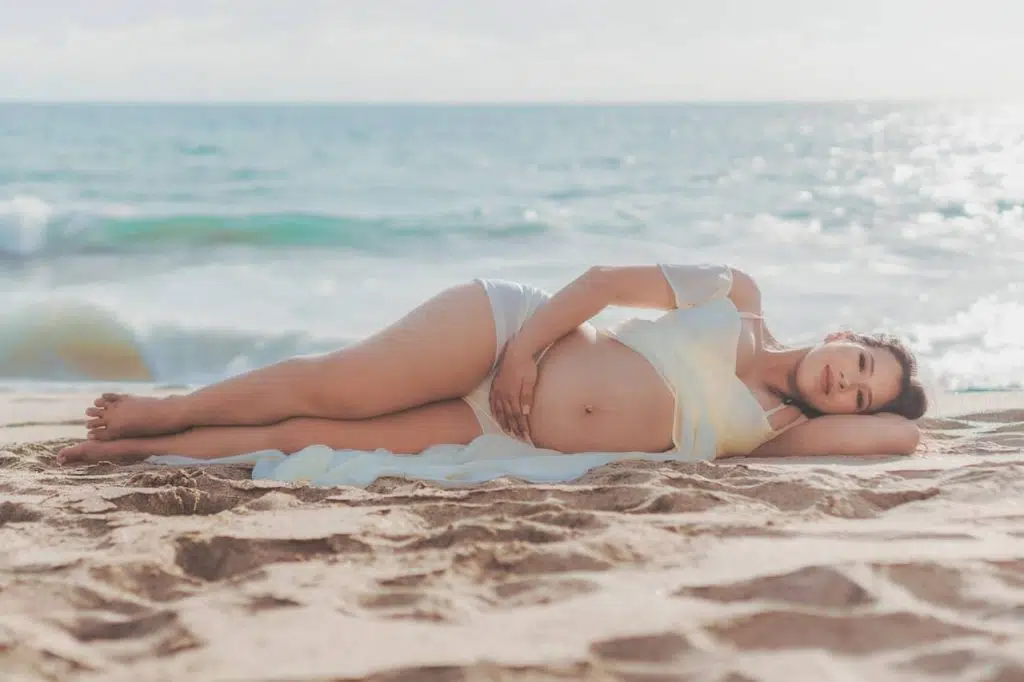 ocean waves hitting pregnant belly